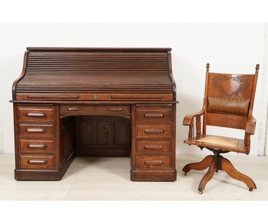 Oak roll top desk, circa 1900, with
