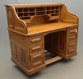 Oak rolltop desk. 55'' W 31''