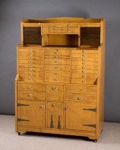 OAK STEP-FRONT DENTAL CABINET,