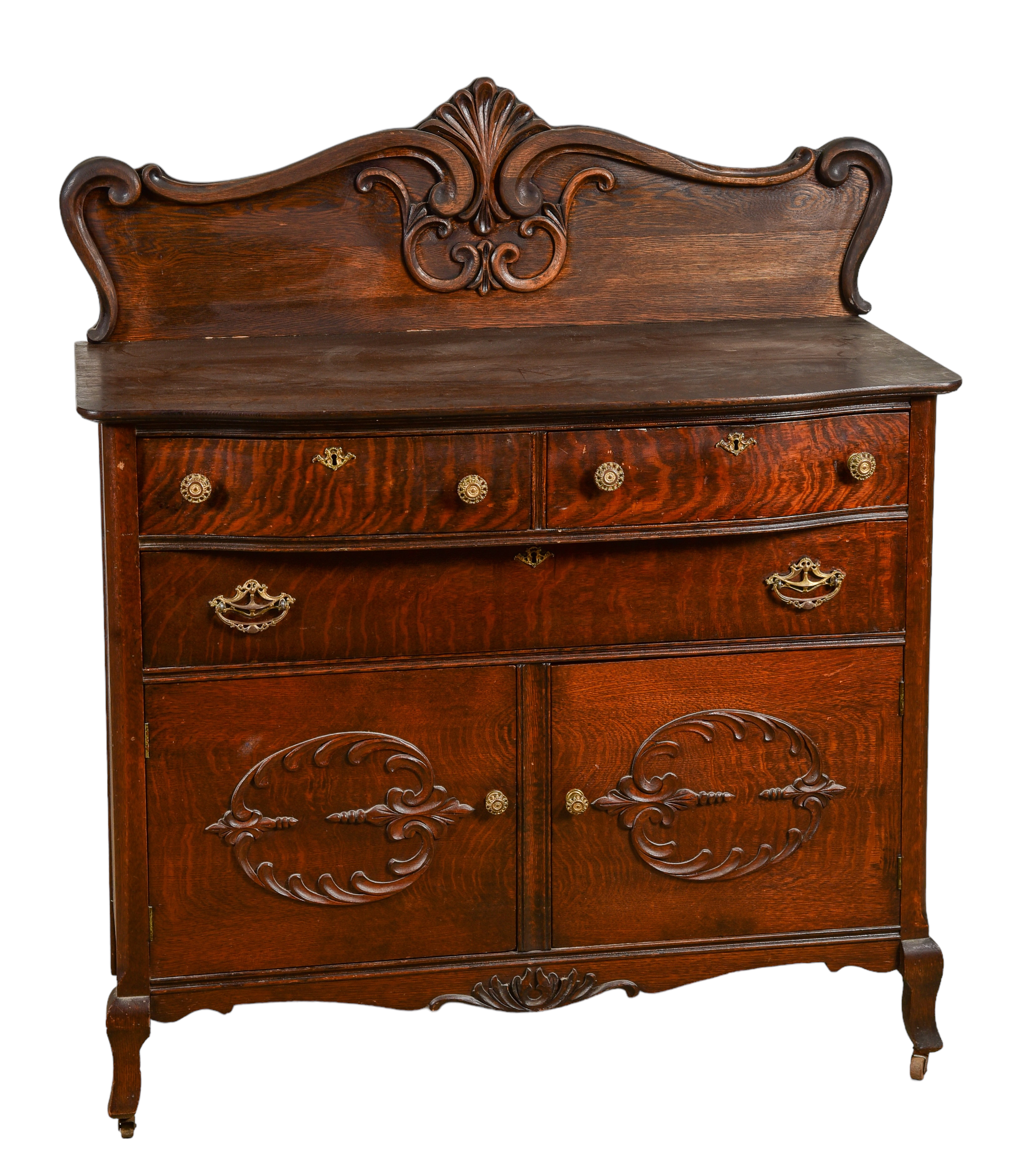 Oak Victorian sideboard with carved