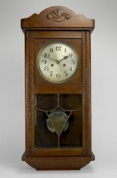 OAK WALL CLOCKOak wall clock.
