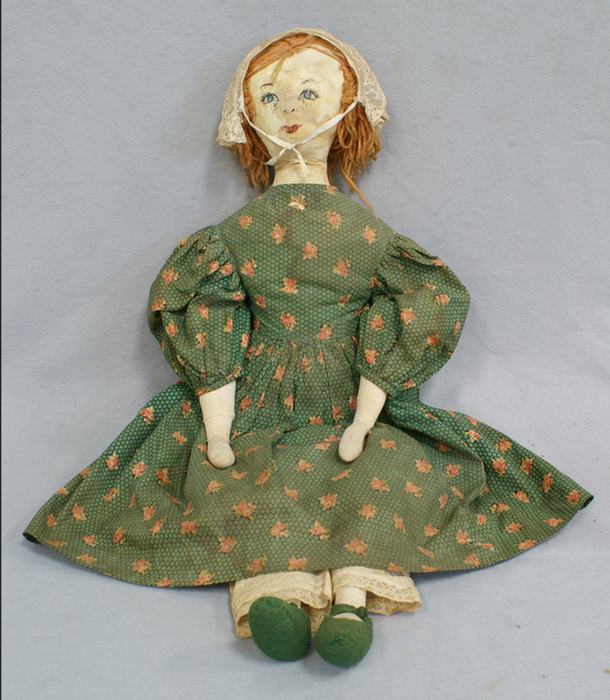 Oilcloth and linen folk art doll,