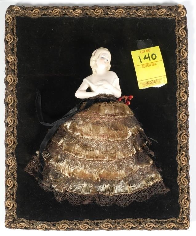 OLD HALF DOLL ON VELVET FRAME