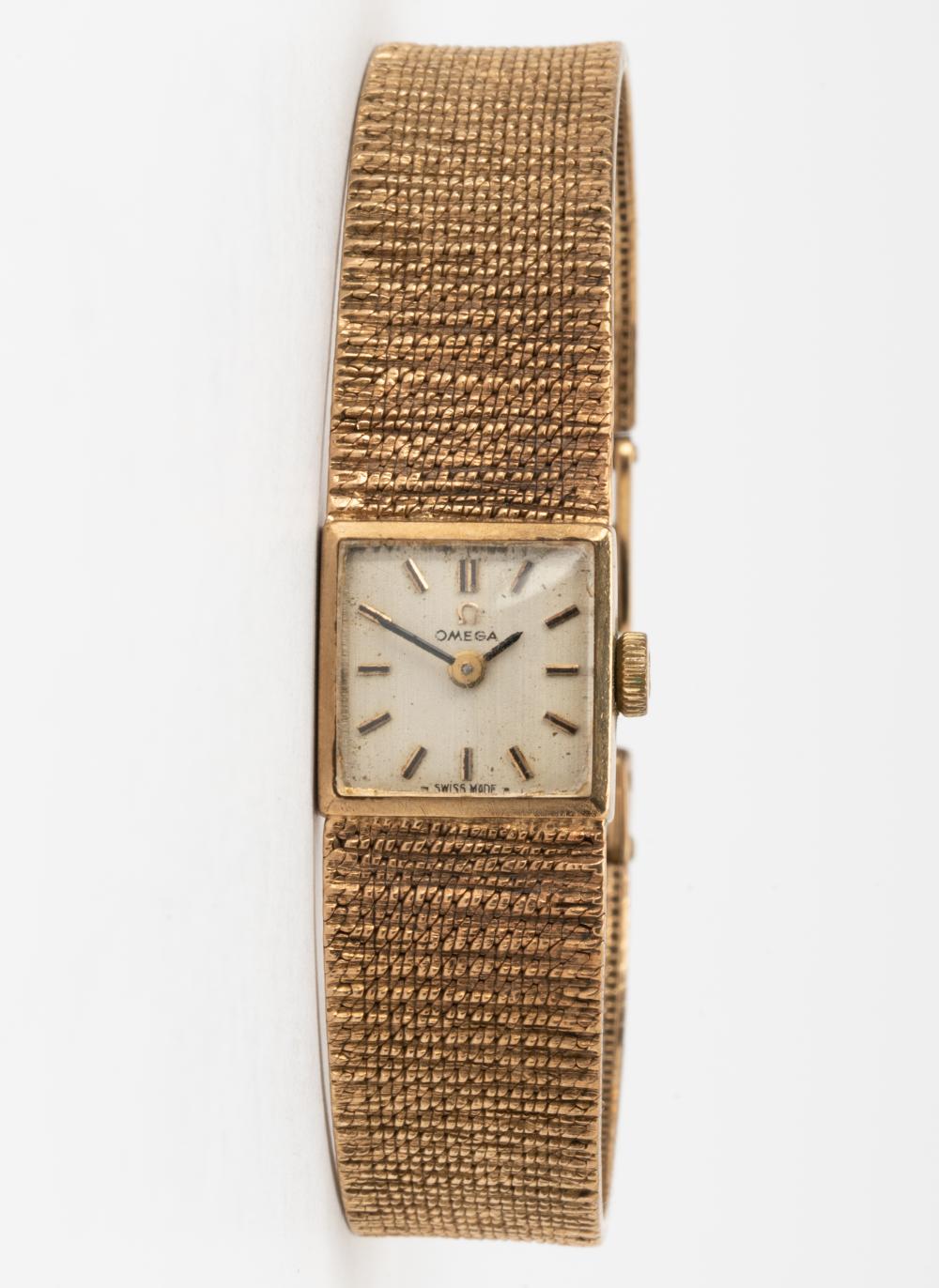 OMEGA 9 KARAT YELLOW GOLD