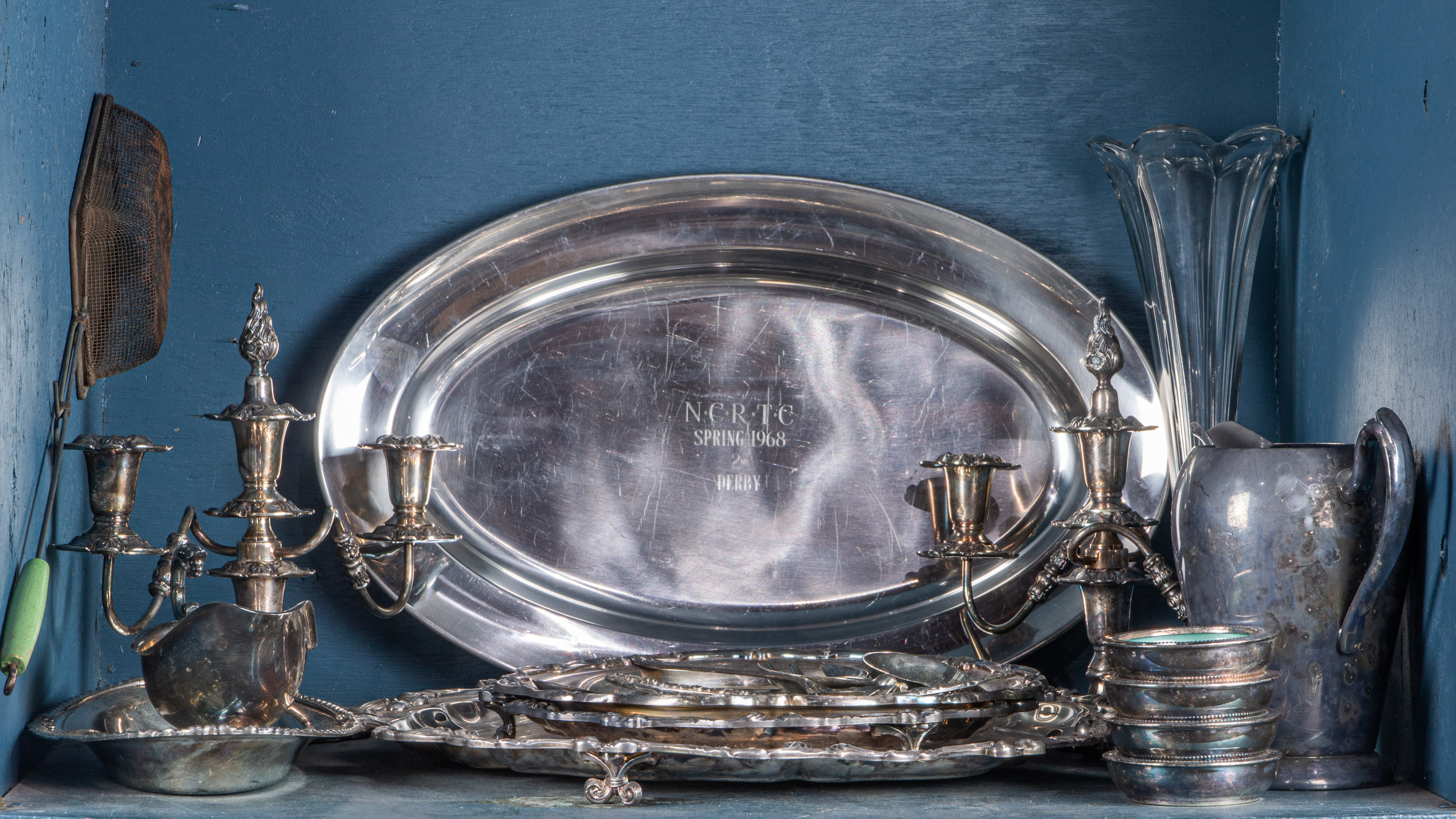 ONE BIN OF MOSTLY SILVER PLATE
