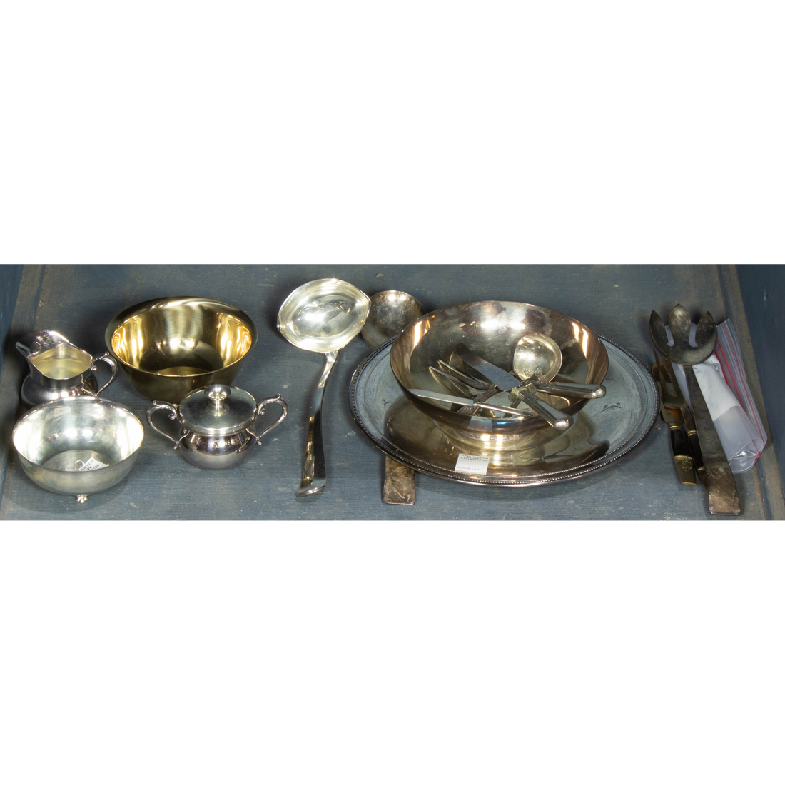 ONE BIN OF SILVER PLATE TABLE