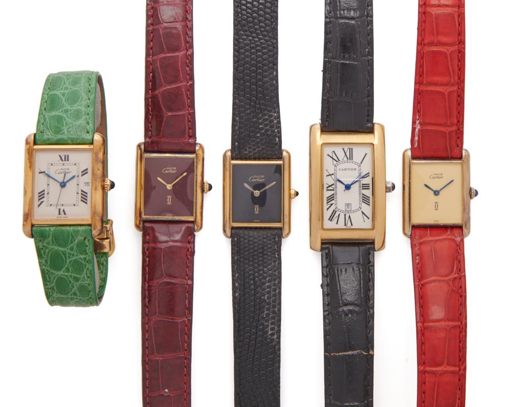 ONE CARTIER WRISTWATCH AND FOUR