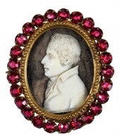 ONE CARVED MINIATURE BROOCH WI