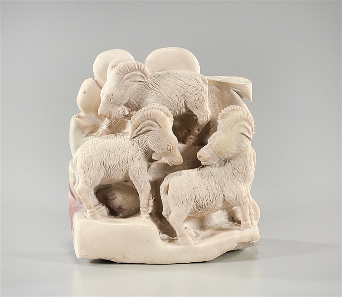 One Chinese carved stone group of