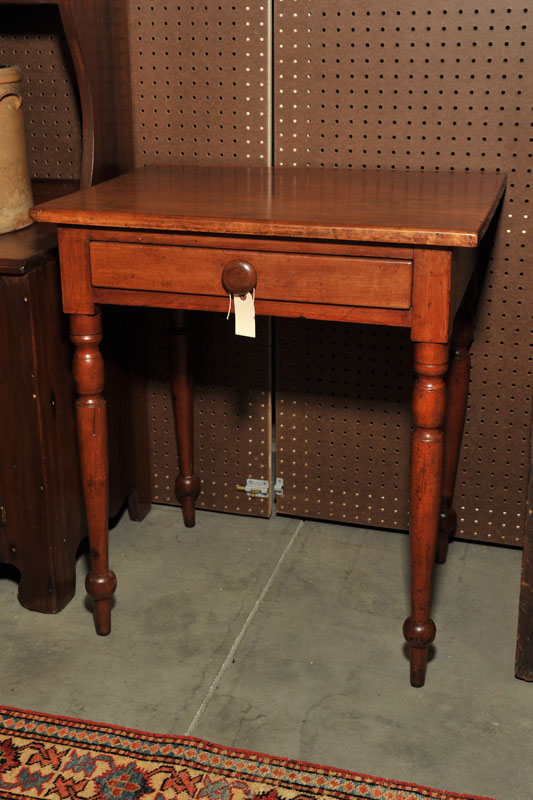 ONE DRAWER STAND. Cherry having a