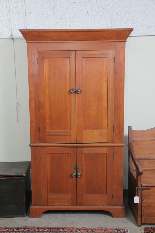 ONE PIECE CUPBOARD. Cherry having