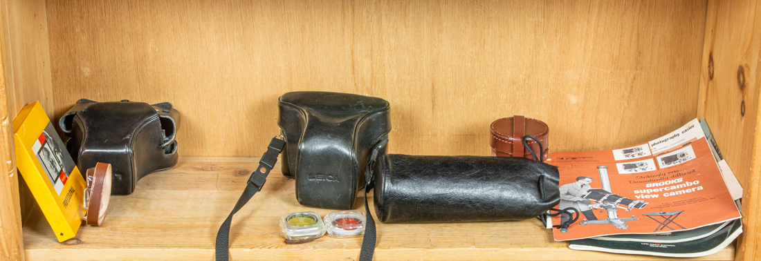 ONE SHELF OF CAMERA EQUIPMENT