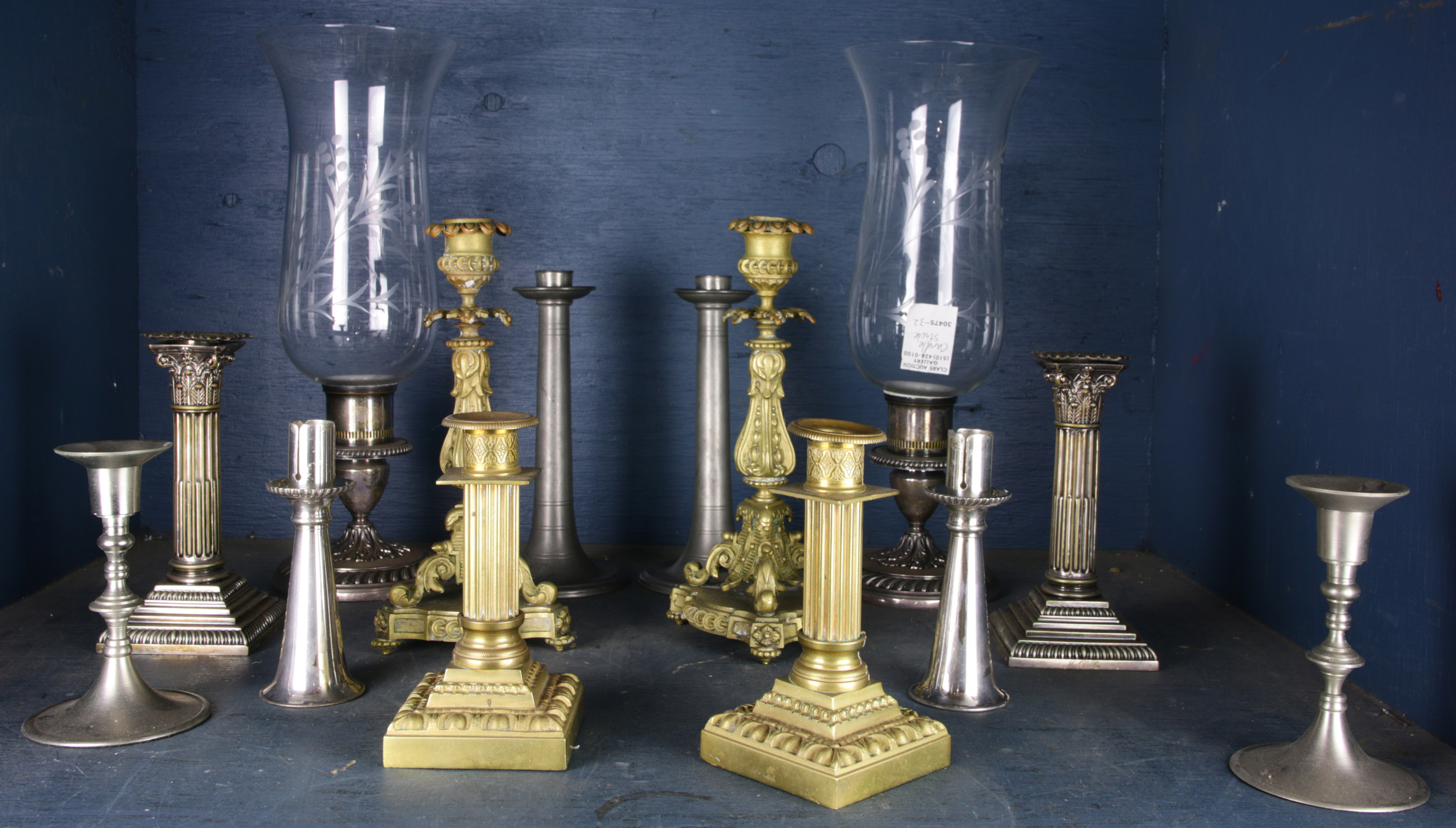 ONE SHELF OF CANDLESTICKS One shelf