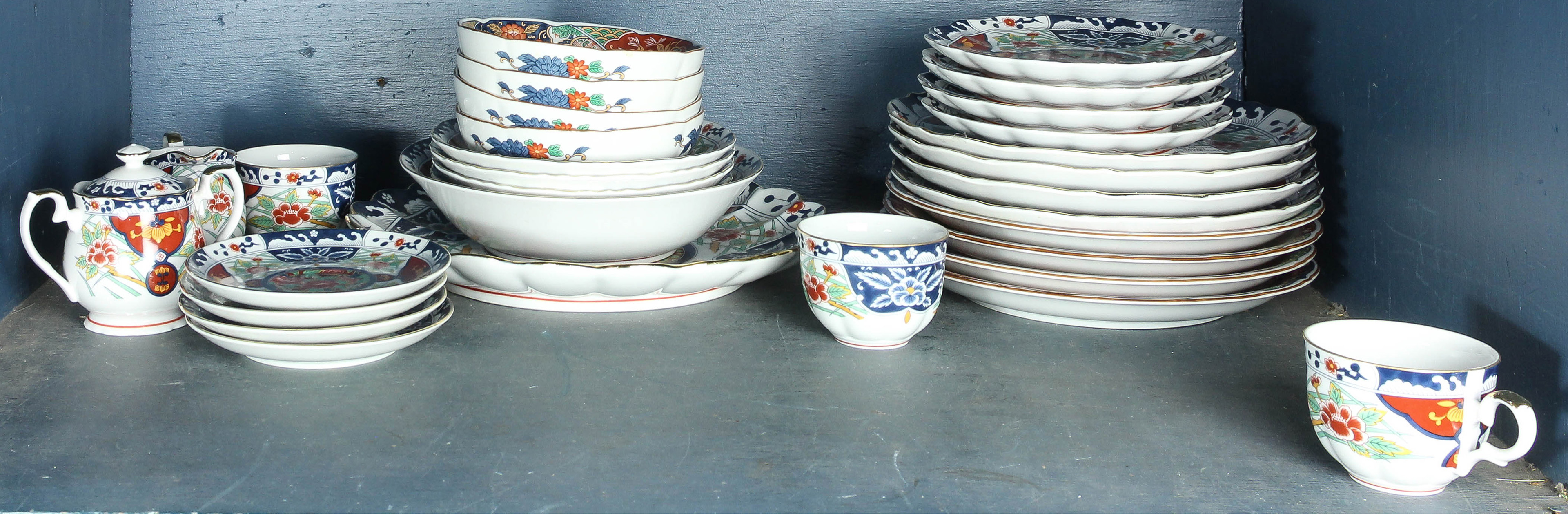 ONE SHELF OF GUMP'S CHINA One shelf