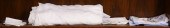 ONE SHELF OF LINEN NAPKINS AND