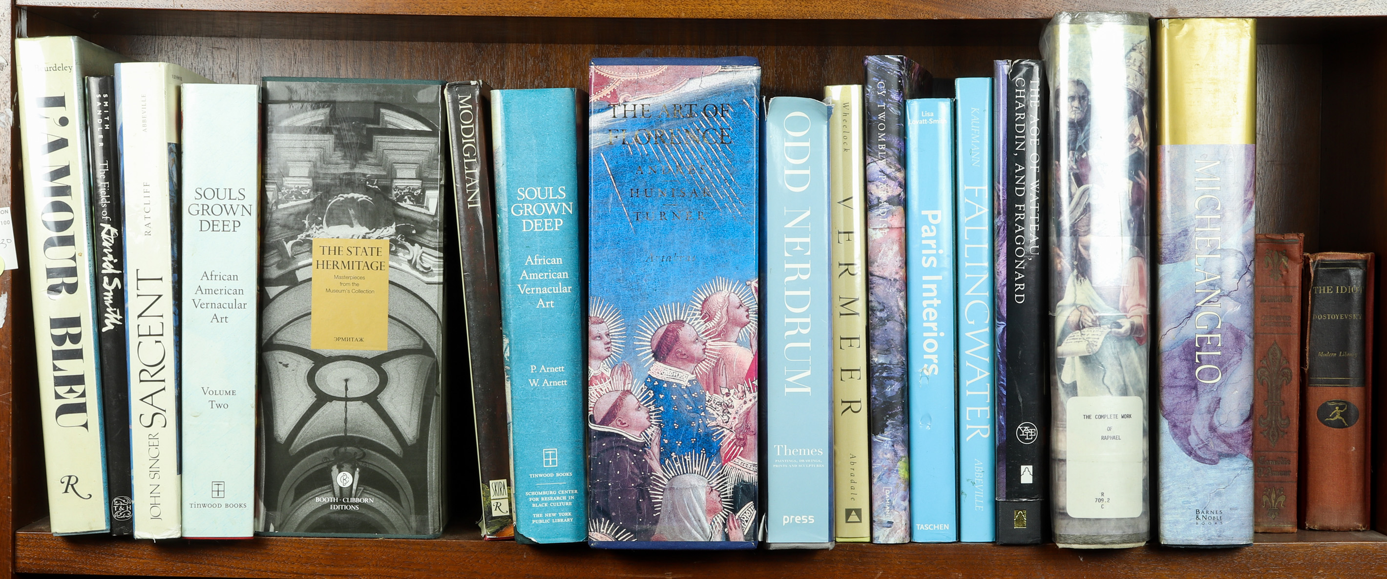 ONE SHELF OF MOSTLY ART BOOKS One