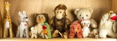 ONE SHELF OF STUFFED ANIMALS O