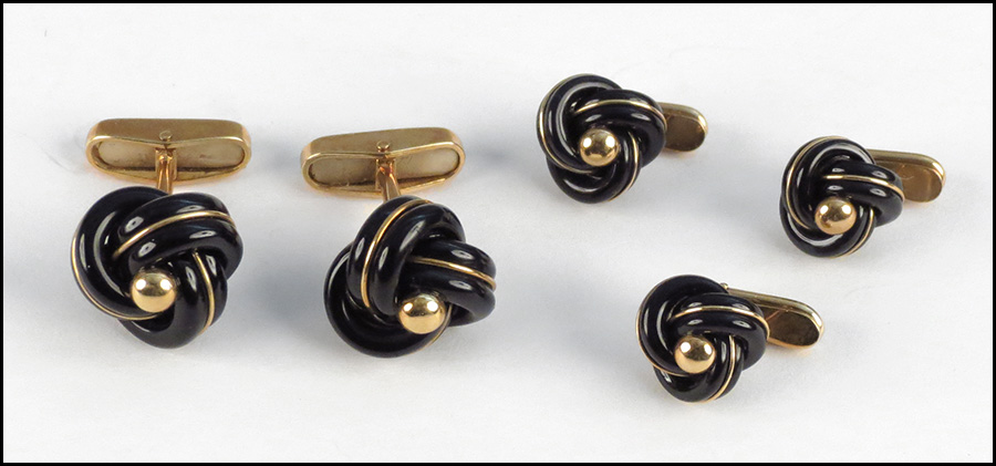ONYX AND 18 KARAT YELLOW GOLD DRESS