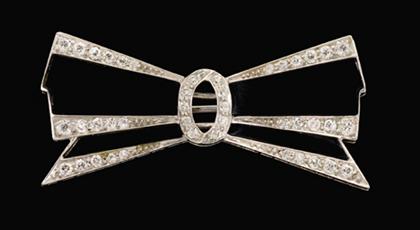 Onyx and diamond bow brooch, J.E.