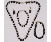 Onyx bead and alternating 14k