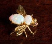 OPAL AND EIGHTEEN KARAT GOLD B