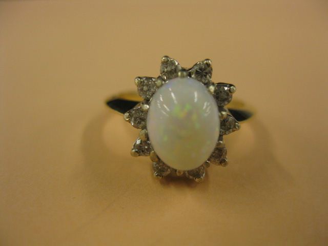 Opal & Diamond Ring fiery oval