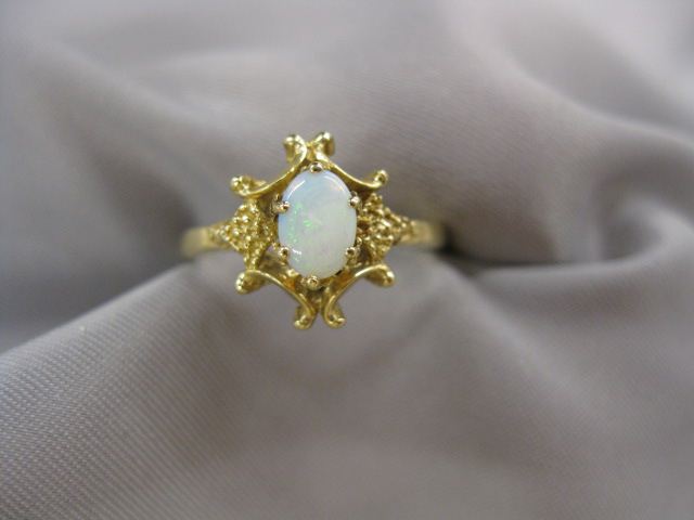 Opal Ring fiery oval gem in 14k
