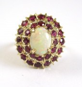 OPAL, RUBY AND FOURTEEN KARAT