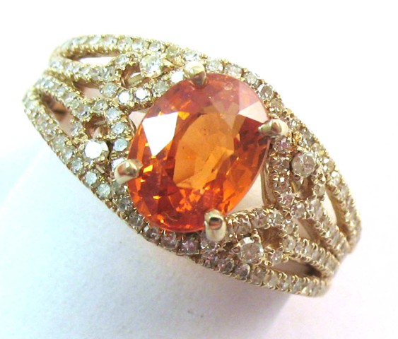 ORANGE SAPPHIRE AND DIAMOND RING