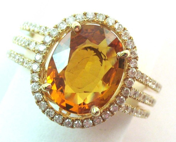 ORANGE SAPPHIRE AND DIAMOND RING