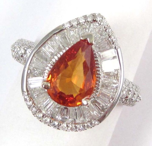 ORANGE SAPPHIRE AND DIAMOND RING
