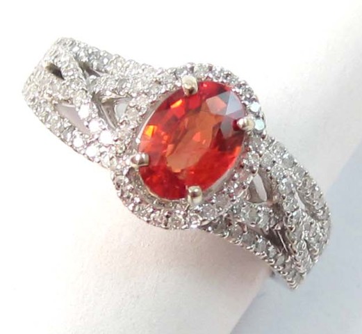 ORANGE SAPPHIRE AND DIAMOND RING