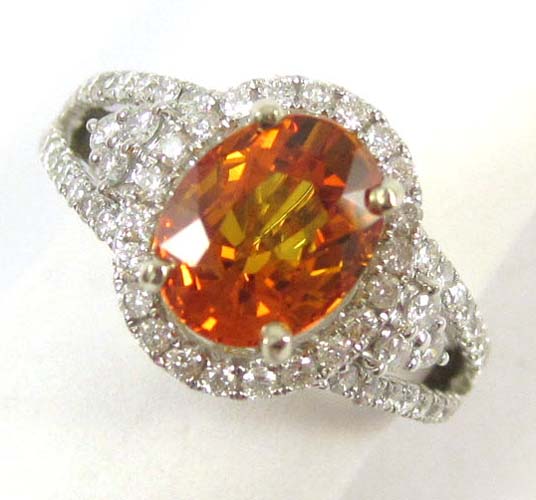 ORANGE SAPPHIRE AND DIAMOND RING