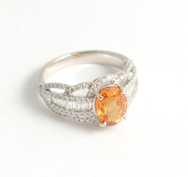 ORANGE SAPPHIRE AND DIAMOND RING
