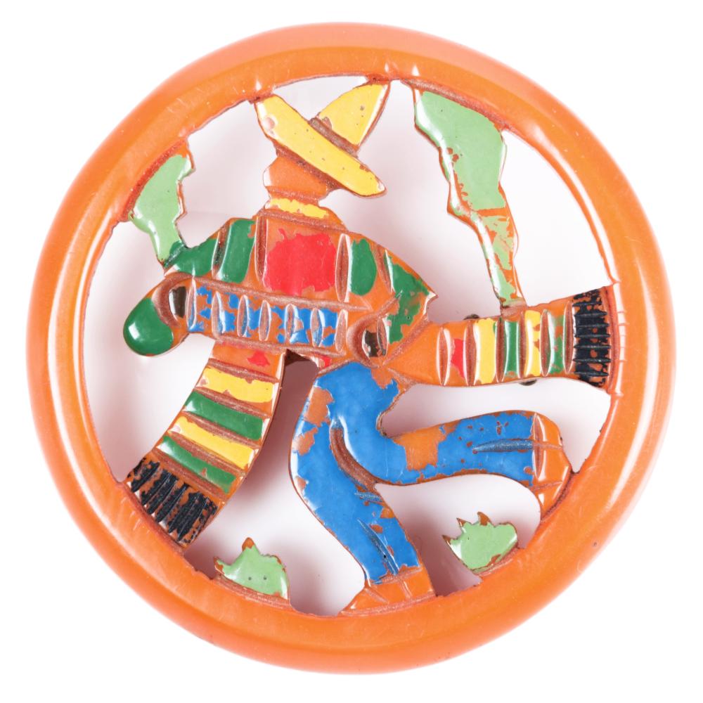 ORANGE VINTAGE BAKELITE PIERCE