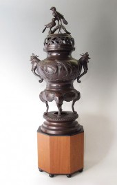 ORIENTAL CAST METAL CENSOR WIT