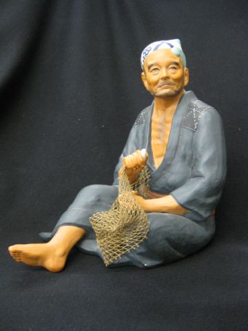 Oriental Pottery Figurine of Seated