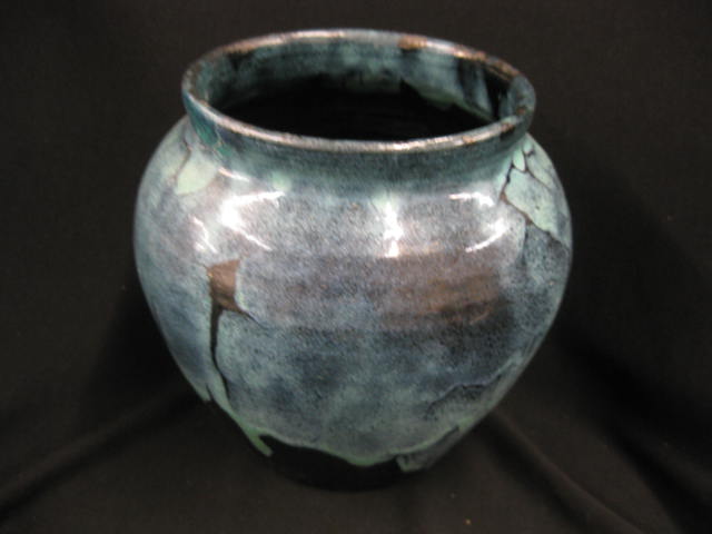Oriental Pottery Vase with warriors