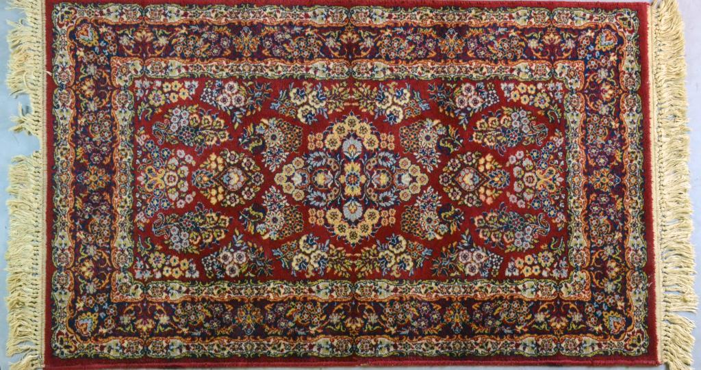 Oriental RugDark red with cream and