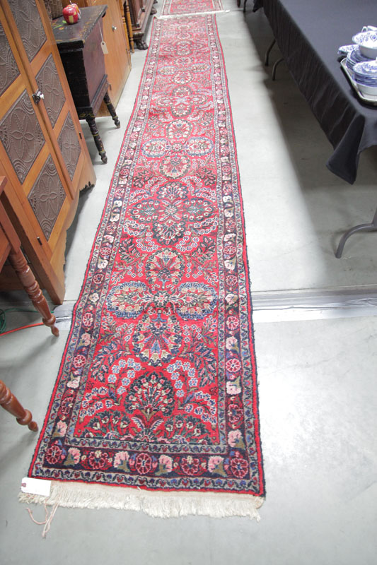 ORIENTAL STYLE RUNNER. Red ground