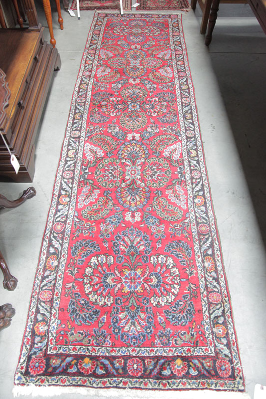ORIENTAL STYLE RUNNER. Red ground