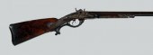 Ornate double-barrel shotgun,