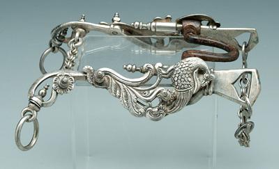 Ornate silver bit, ornate