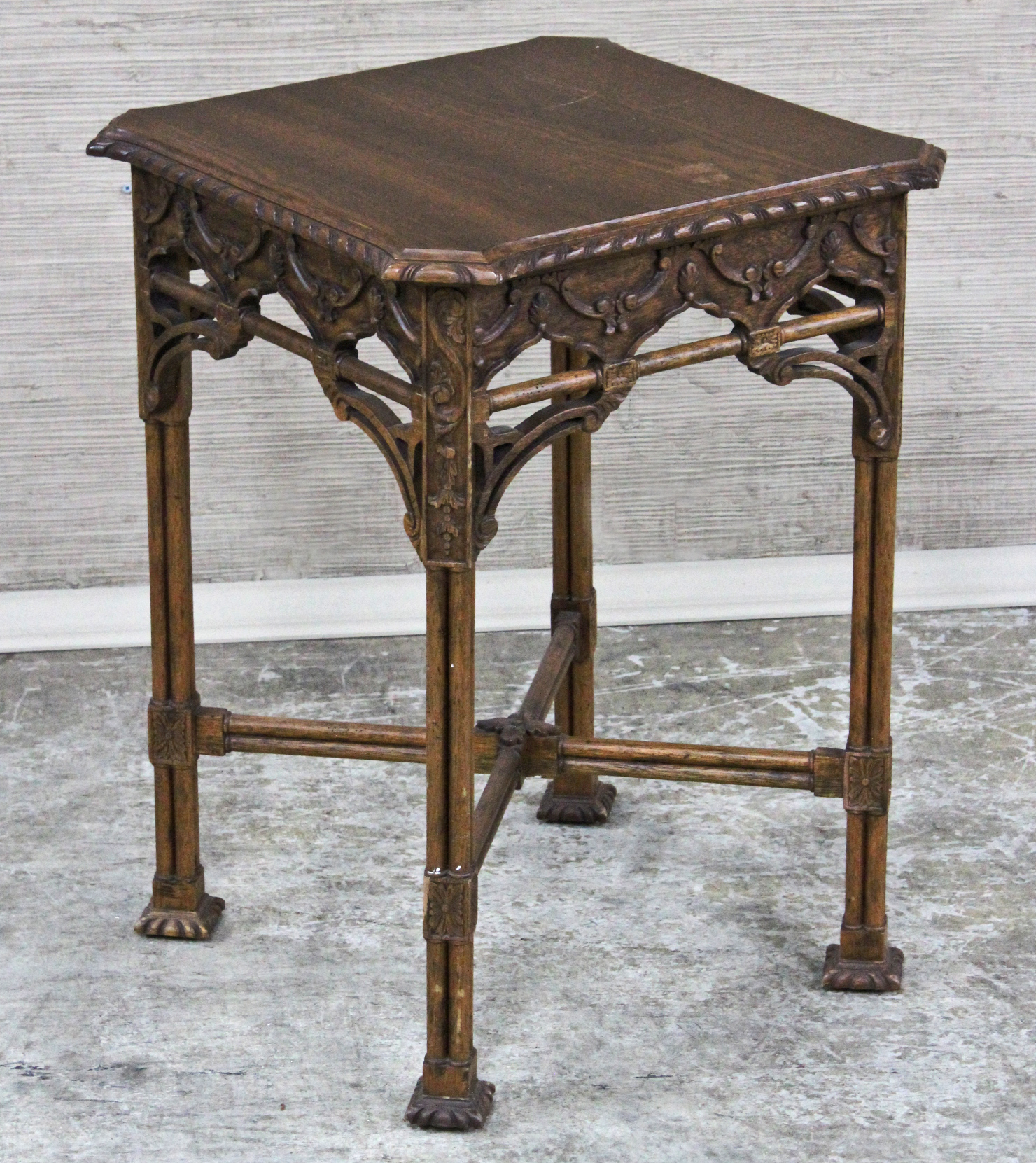 ORNATELY CARVED OCCASIONAL TABLE
