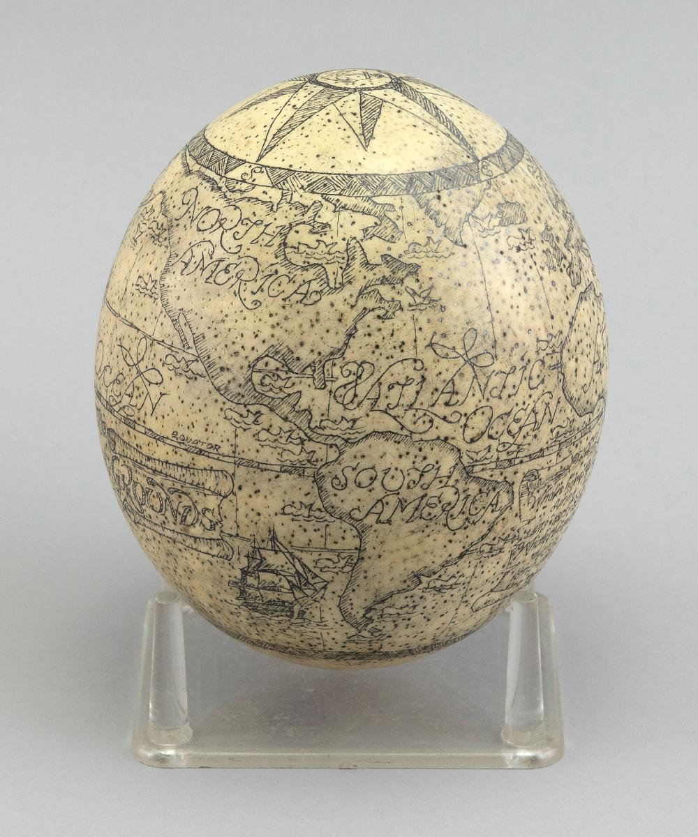 OSTRICH EGG ENGRAVED AS A GLOBE