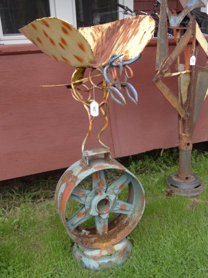 Outdoor sculpture winged