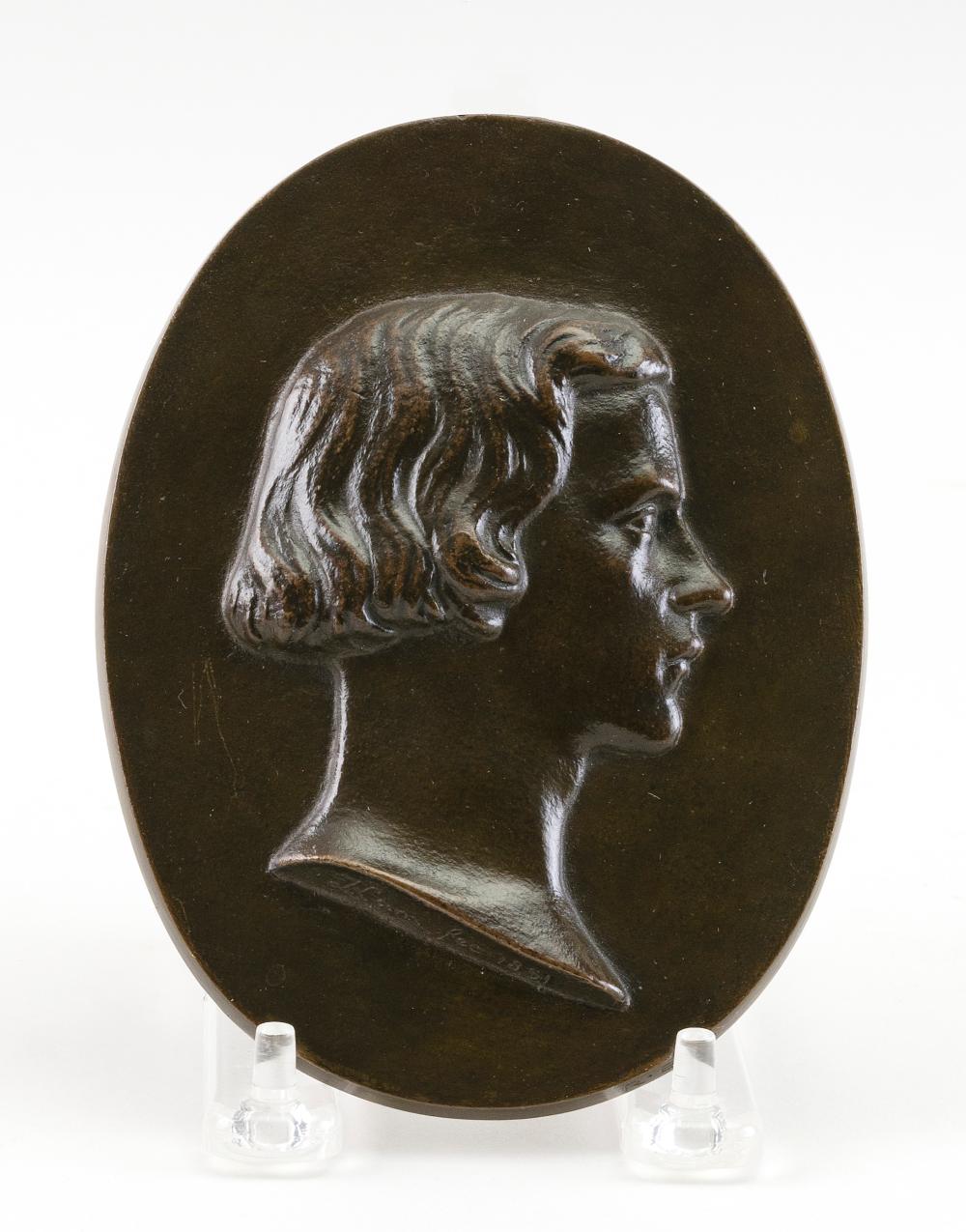 OVAL BRONZE PLAQUE DEPICTING A BUST