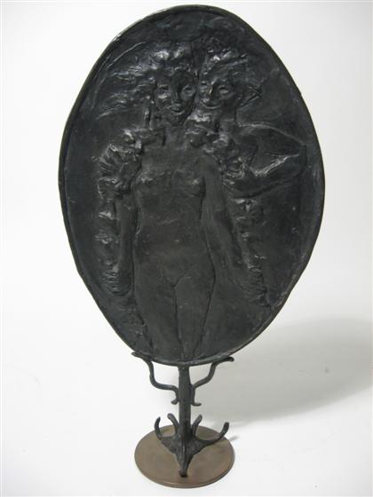 Oval bronze plaque on stand   