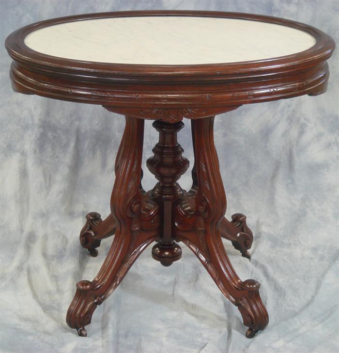 Oval carved walnut Victorian marble