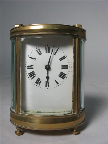 Oval French brass and glass